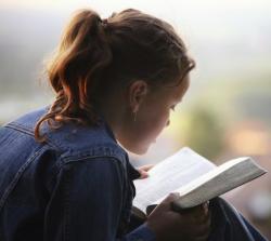 Girl reading Bible